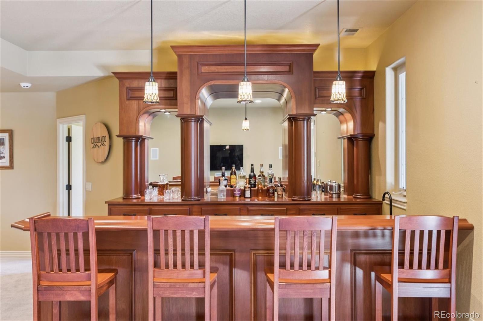 7994 Monarch Road Larkspur, CO 80118 - Photo 23 of 48 a dining room with furniture and window