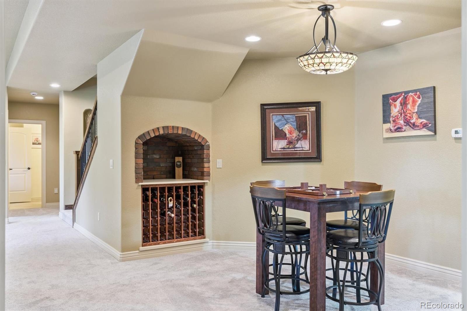7994 Monarch Road Larkspur, CO 80118 - Photo 25 of 48 a view of a dining room with furniture