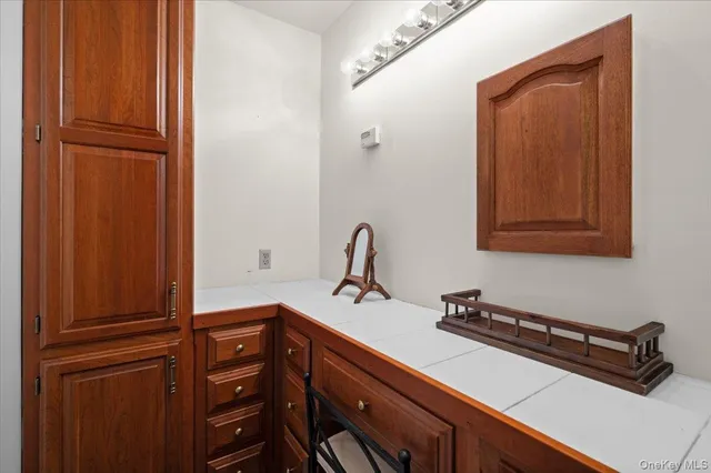 a view of a sink and a mirror