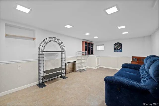 a view of livingroom with furniture and windows