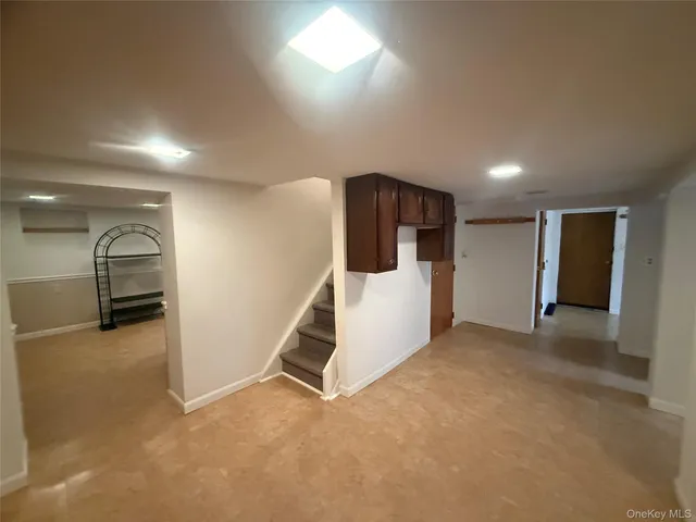 a view of a livingroom with a staircase