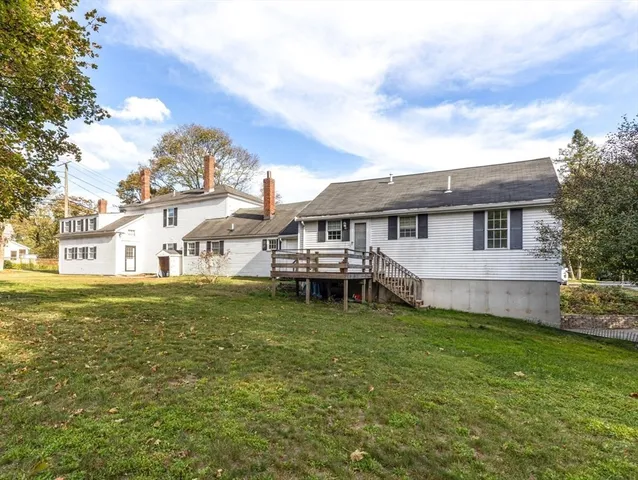 an aerial view of residential building with parking space
