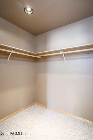 3244 Outlaw Trail Overgaard, AZ 85933 - Photo 18 of 29 a view of a room with racks on the wall