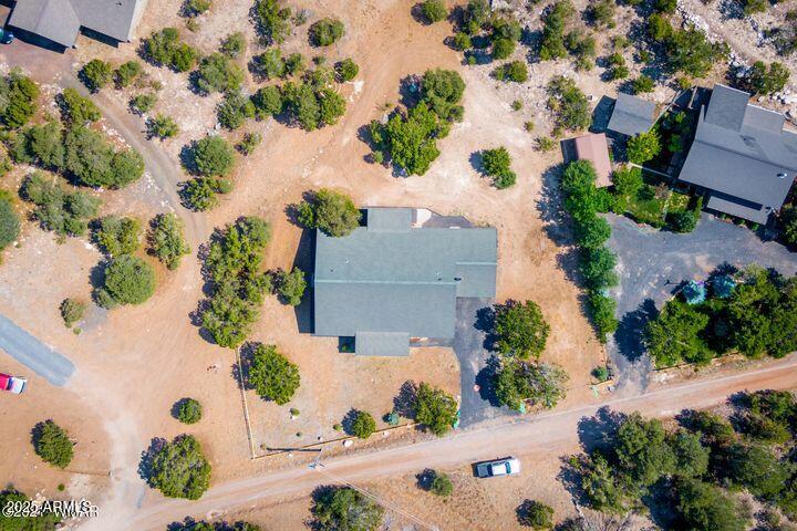3244 Outlaw Trail Overgaard, AZ 85933 - Photo 27 of 29 an aerial view of house with yard