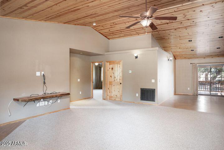 3244 Outlaw Trail Overgaard, AZ 85933 - Photo 9 of 29 a view of a livingroom with a fireplace