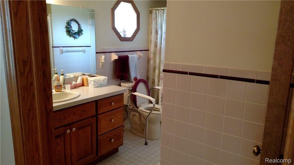 5984 Brockway Road Peck, MI 48466 - Photo 11 of 24 This is a view of the master bathroom.