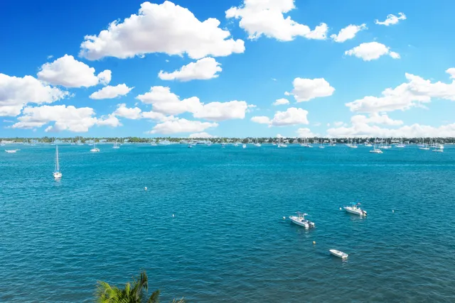 a view of a living room and a balcony