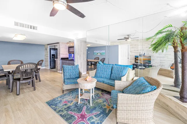 a living room with furniture and a rug