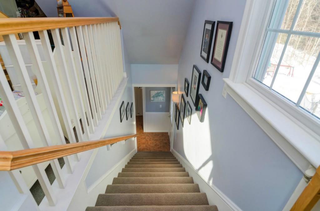 109 Foreside Road Cumberland Foreside, ME 04110 - Photo 15 of 19 Staircase to bonus room w gas stove