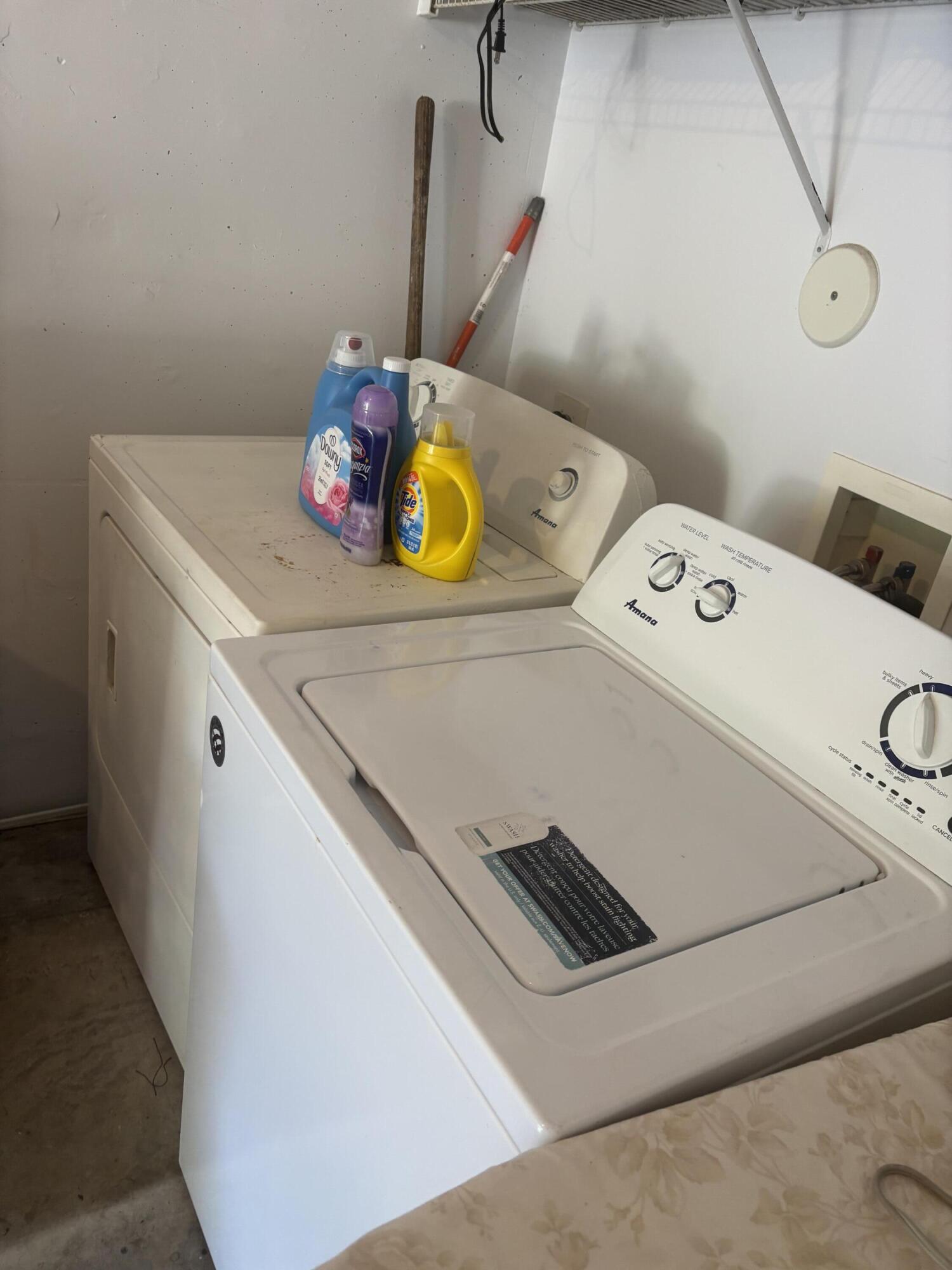 350 Crestwood Circle, Unit 106 Royal Palm Beach, FL 33411 - Photo 13 of 28 a utility room with dryer and washer