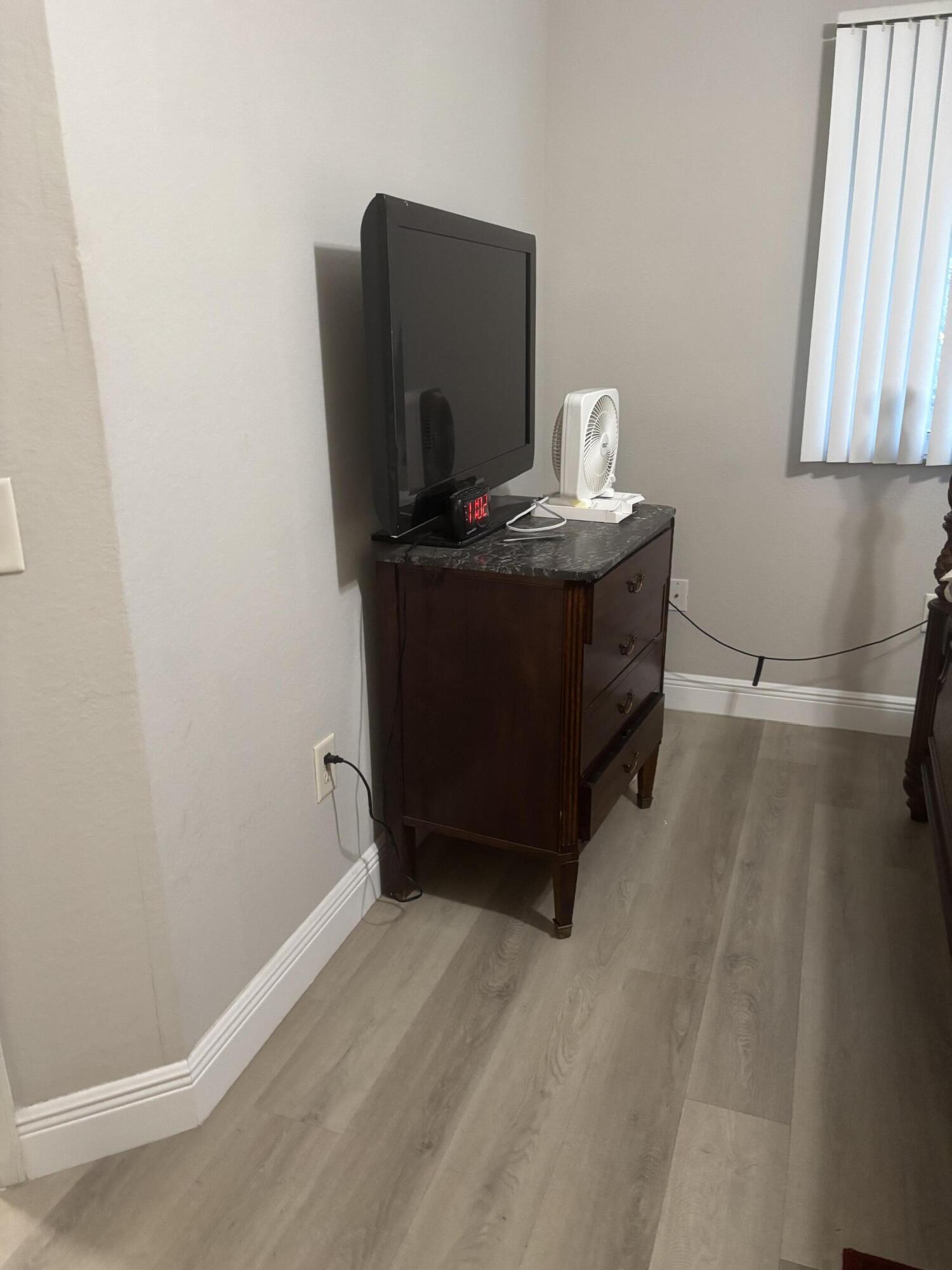 350 Crestwood Circle, Unit 106 Royal Palm Beach, FL 33411 - Photo 18 of 28 a room with a window