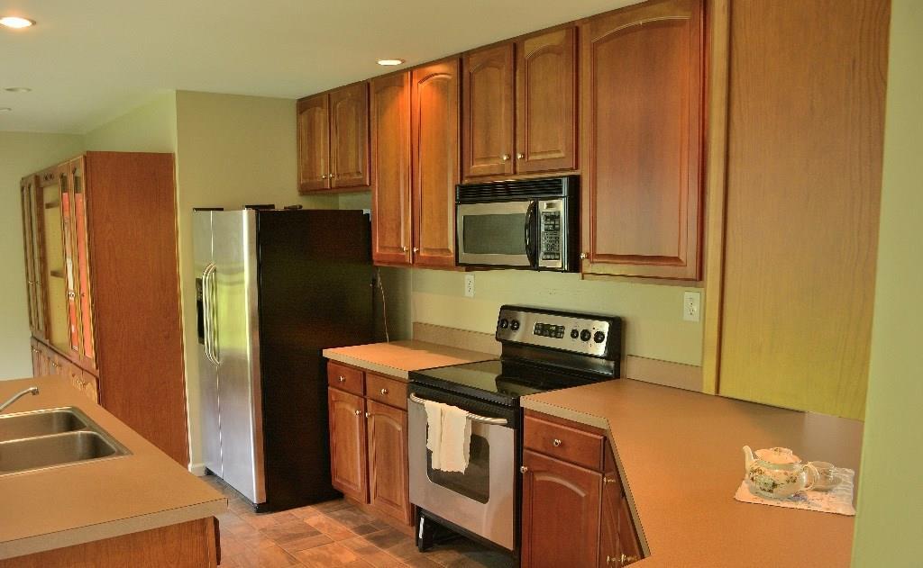219 Range Road Cumberland, ME 04021 - Photo 5 of 21 Kitchen with stainless appliances