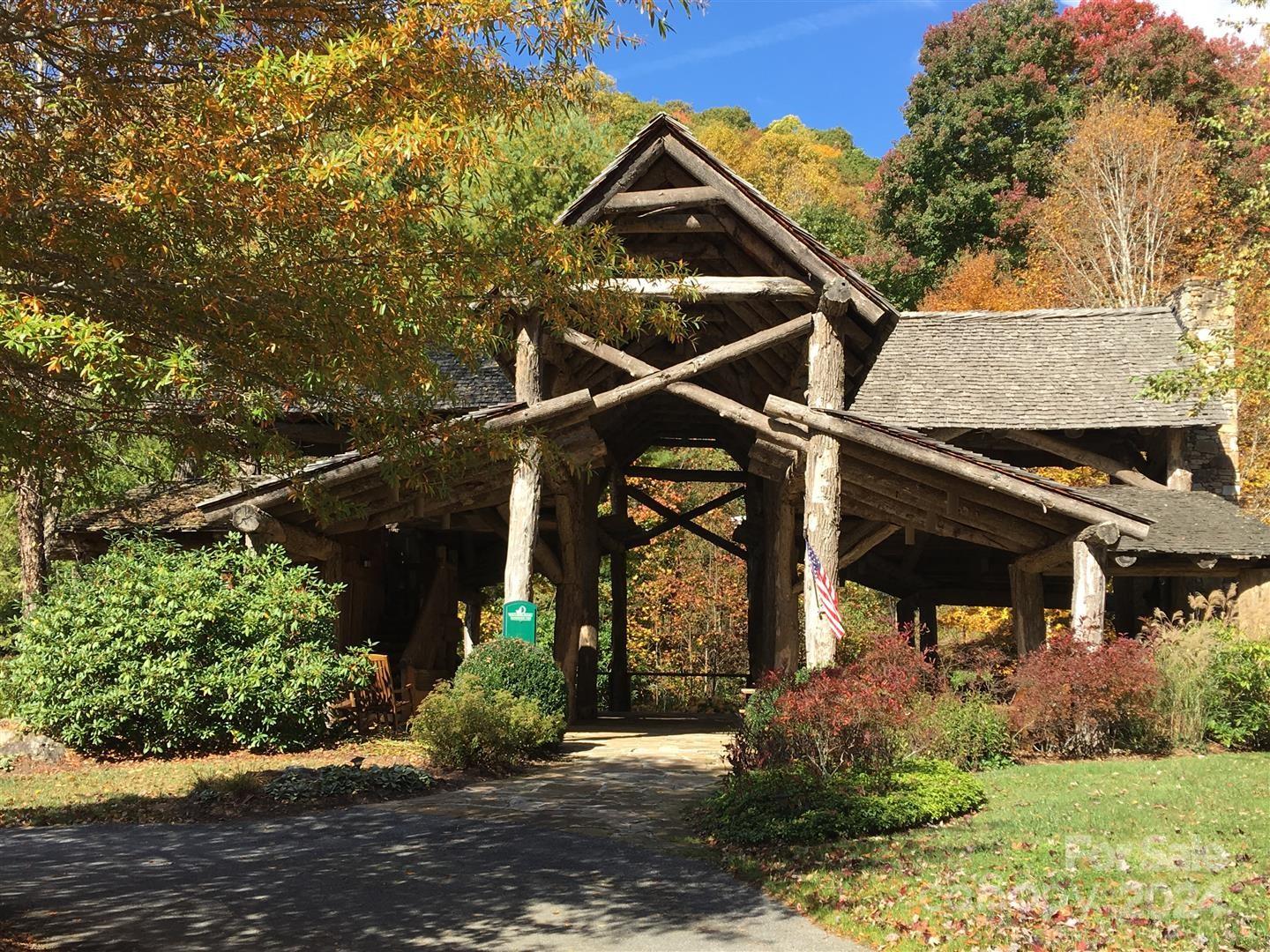 229 Hanging Rock Road Mars Hill, NC 28754 - Photo 15 of 21 front view of a house with a street