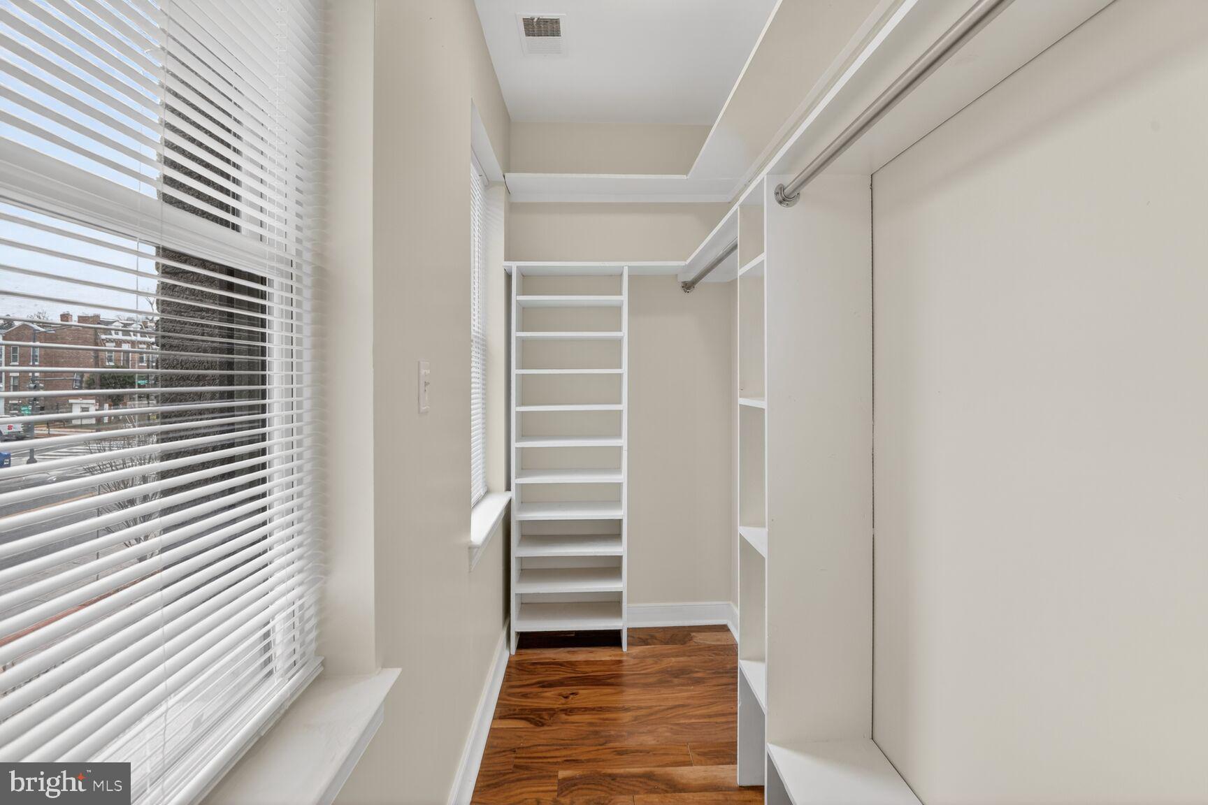 4800 Georgia Avenue Northwest, Unit 205 Washington, DC 20011 - Photo 13 of 15 a view of a room with stairs and a window