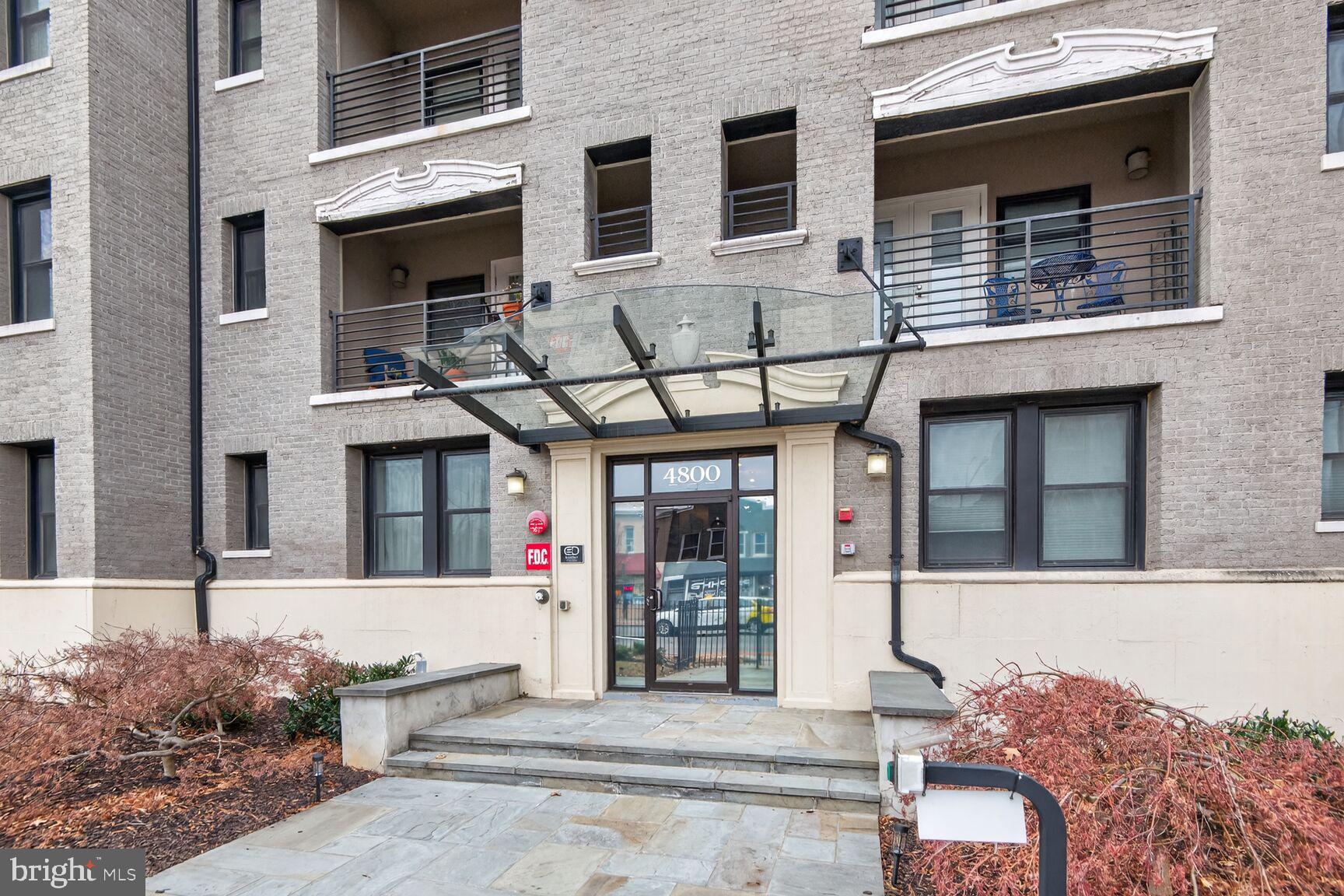 4800 Georgia Avenue Northwest, Unit 205 Washington, DC 20011 - Photo 14 of 15 a front view of a building with windows