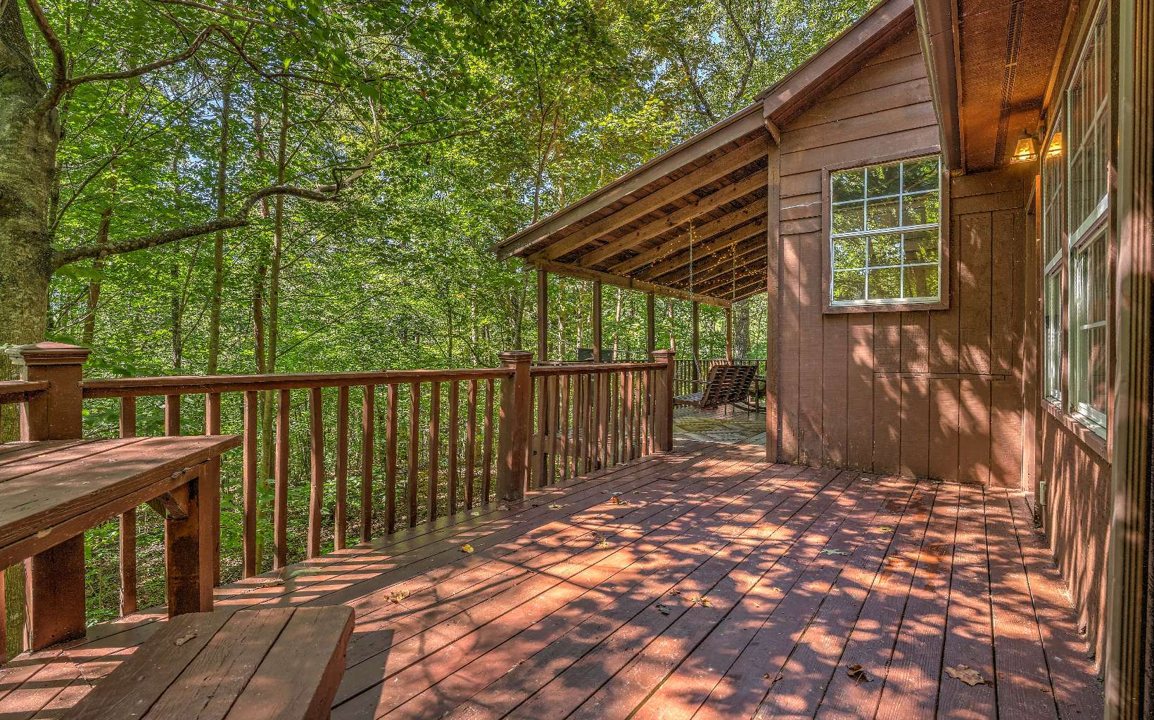 166 Nantahala Pass Road Blue Ridge, GA 30513 - Photo 39 of 40 a view of backyard with a deck and wooden floor
