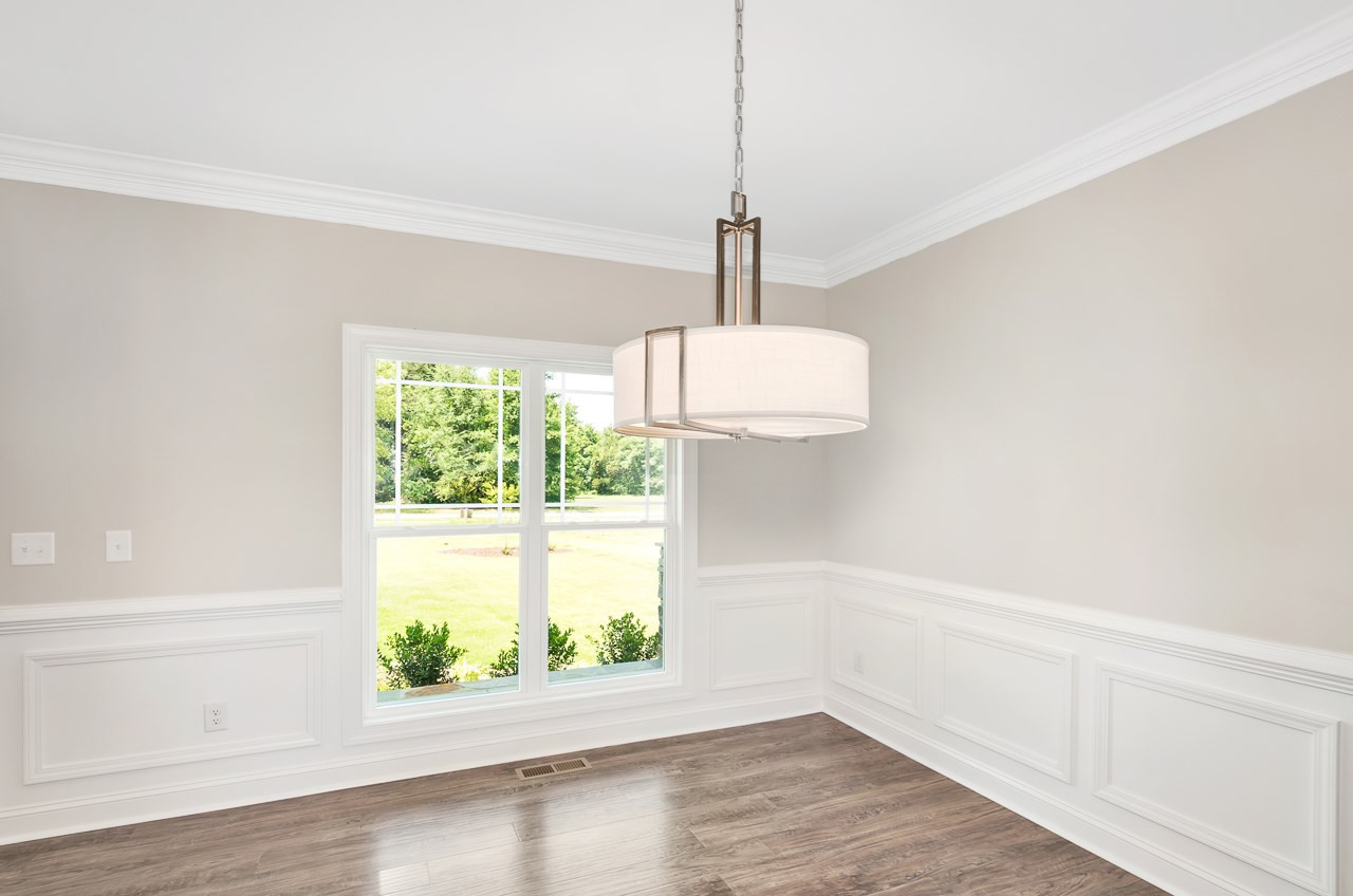 6733 Dwight Rowland Road Willow Spring, NC 27592 - Photo 25 of 25 Open floor plan love those floors easy upkeep Dining Area