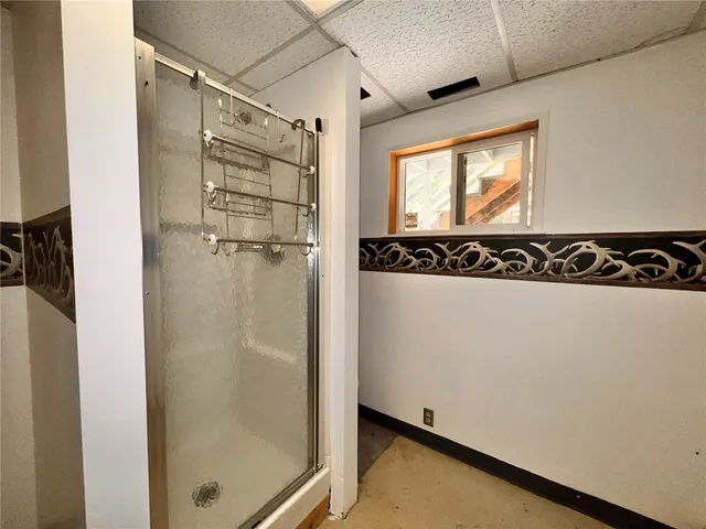 a view of a front door with wooden floor