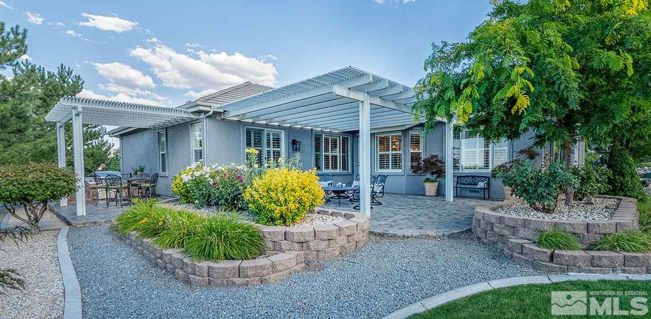 4935 Gila Bend Road Reno, NV 89511 - Photo 2 of 21 a view of a house with backyard and sitting area