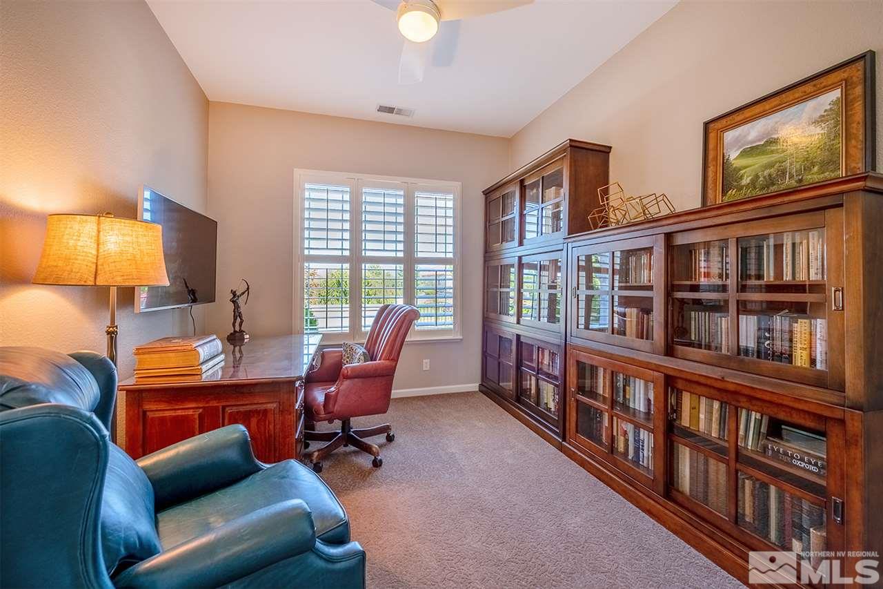 4935 Gila Bend Road Reno, NV 89511 - Photo 9 of 21 a reading room with furniture book shelf and a book shelf