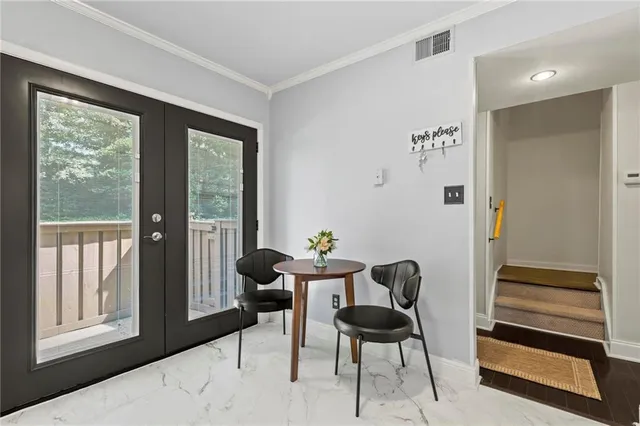 a workspace with furniture and a window