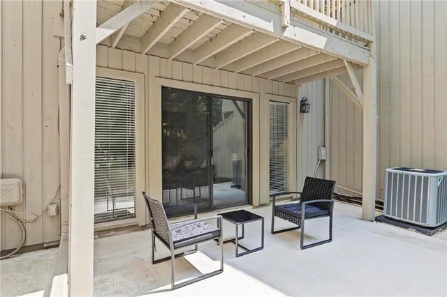 a outdoor living space with furniture and a window