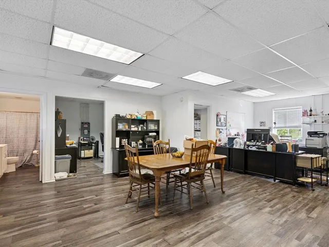a view of a dining room with furniture