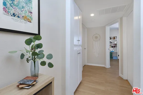 a very nice looking room with a flower pot