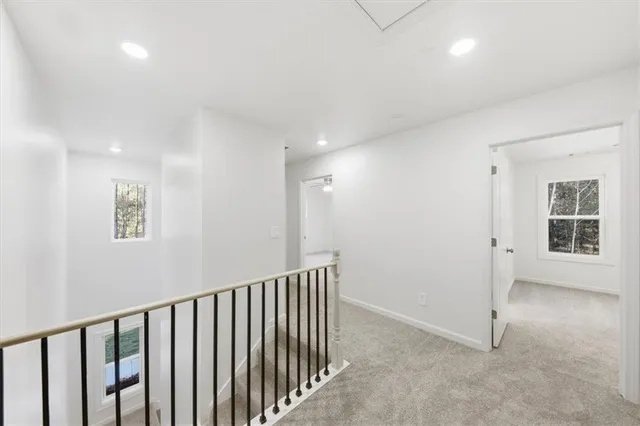 a view of a hallway with workspace