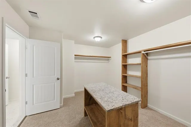 a kitchen that has a cabinets and a sink