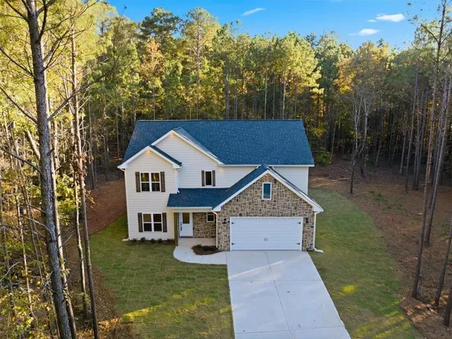a house view with a garden space
