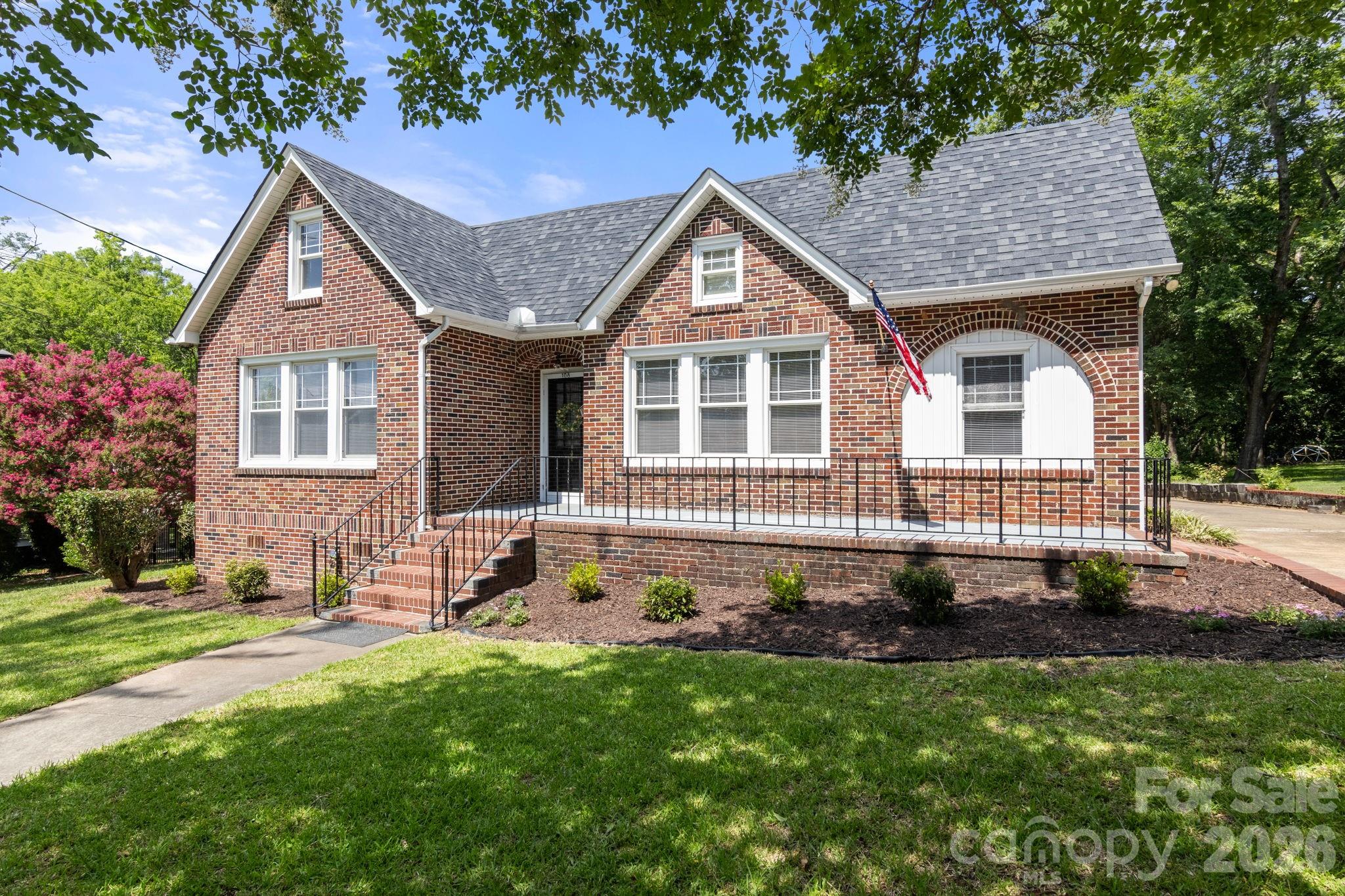 108 Reedy Street Chester, SC 29706 - Photo 42 of 42 a front view of a house with a yard
