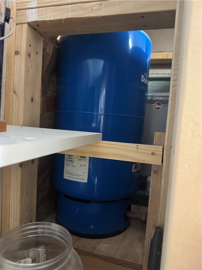 26 Bower Road Newfield, NY 14867 - Photo 35 of 50 Holding tank behind shelving in kitchen