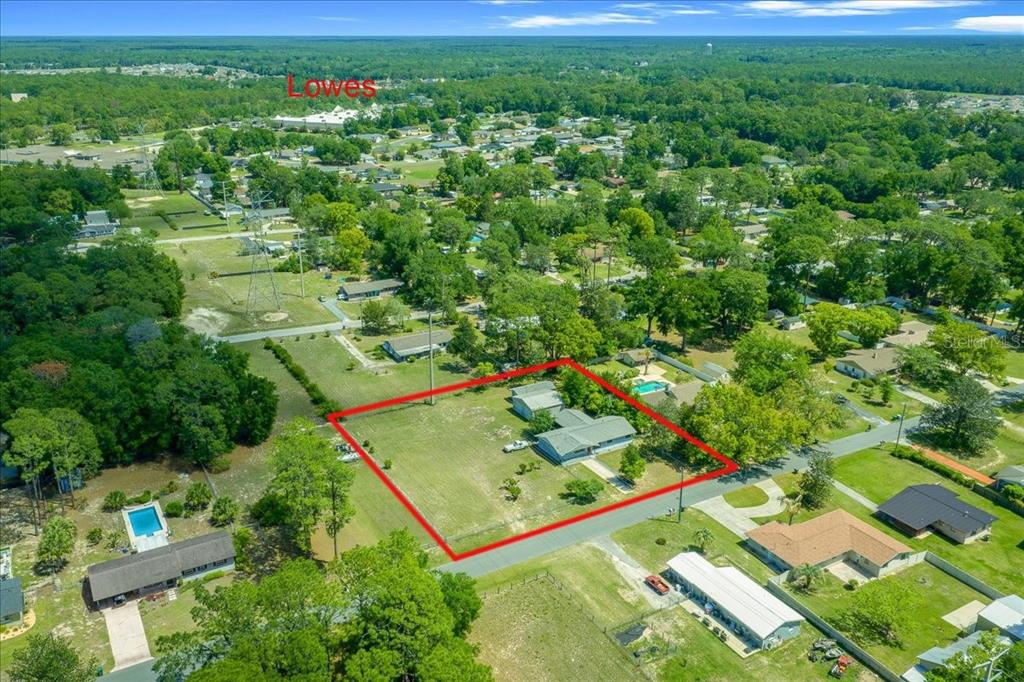 4367 Northeast 11th Street Ocala, FL 34470 - Photo 24 of 24 an aerial view of a residential houses with outdoor space and trees