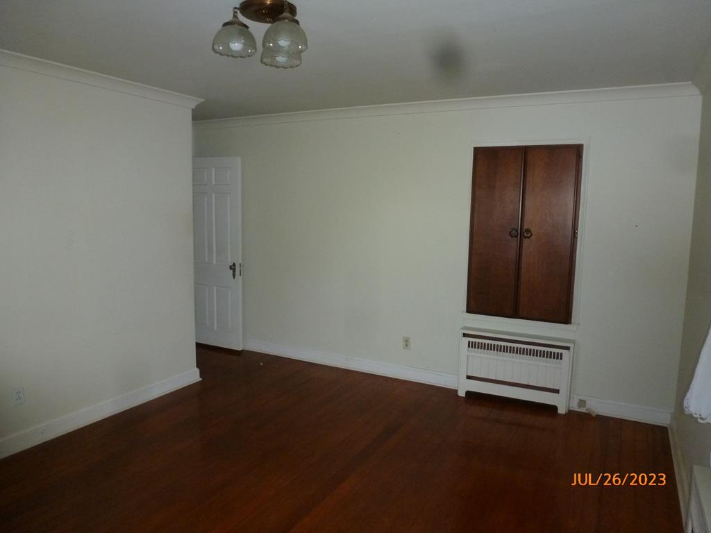 920 Innis St Extension Oil City, PA 16301 - Photo 14 of 21 an empty room with a door