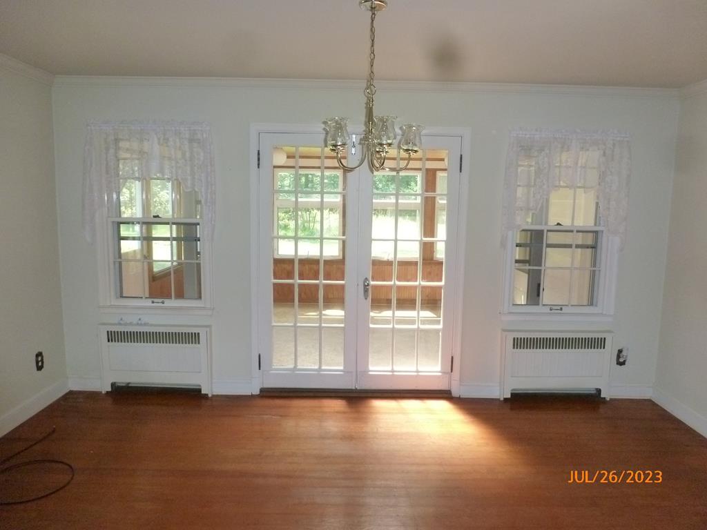 920 Innis St Extension Oil City, PA 16301 - Photo 3 of 21 a view of an empty room with a window