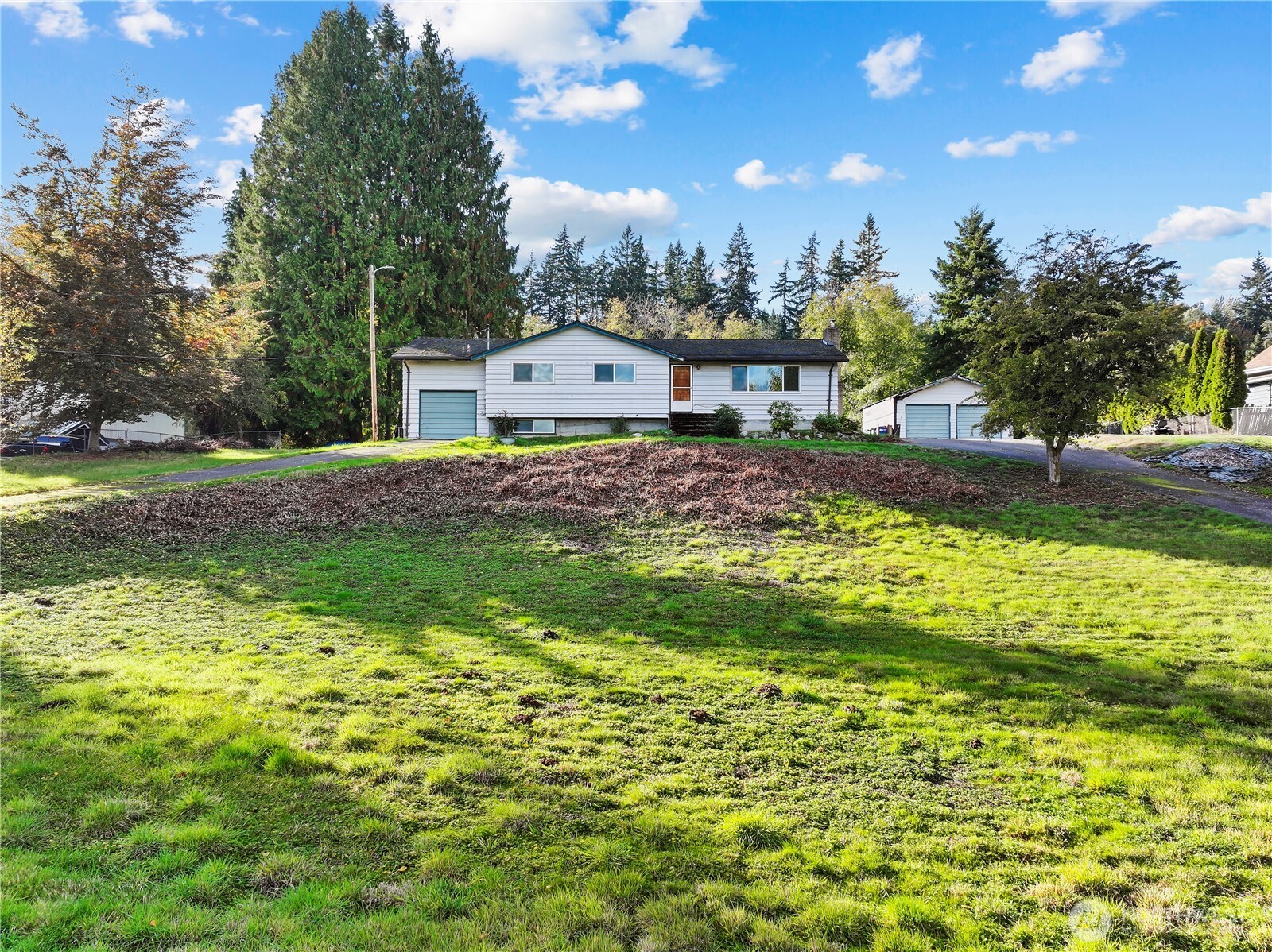 23032 7th Avenue Southeast Bothell, WA 98021 - Photo 1 of 24 a view of a house with a yard