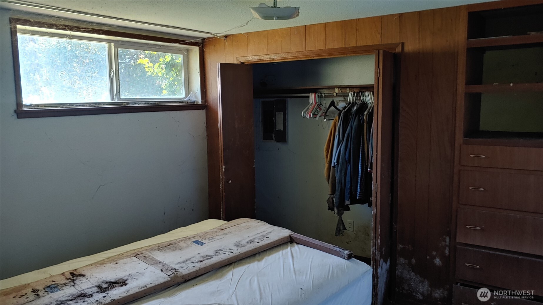 23032 7th Avenue Southeast Bothell, WA 98021 - Photo 13 of 24 a bedroom with a bed and a window