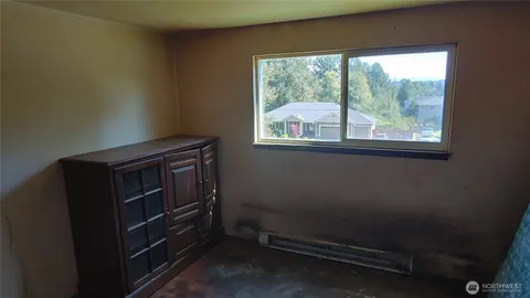 a room with furniture and windows