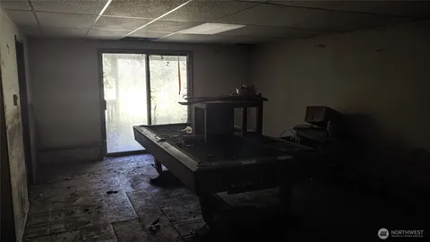 a view of a workspace with furniture