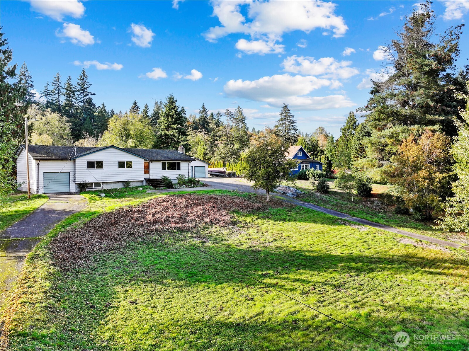 23032 7th Avenue Southeast Bothell, WA 98021 - Photo 21 of 24 a view of a house with a big yard