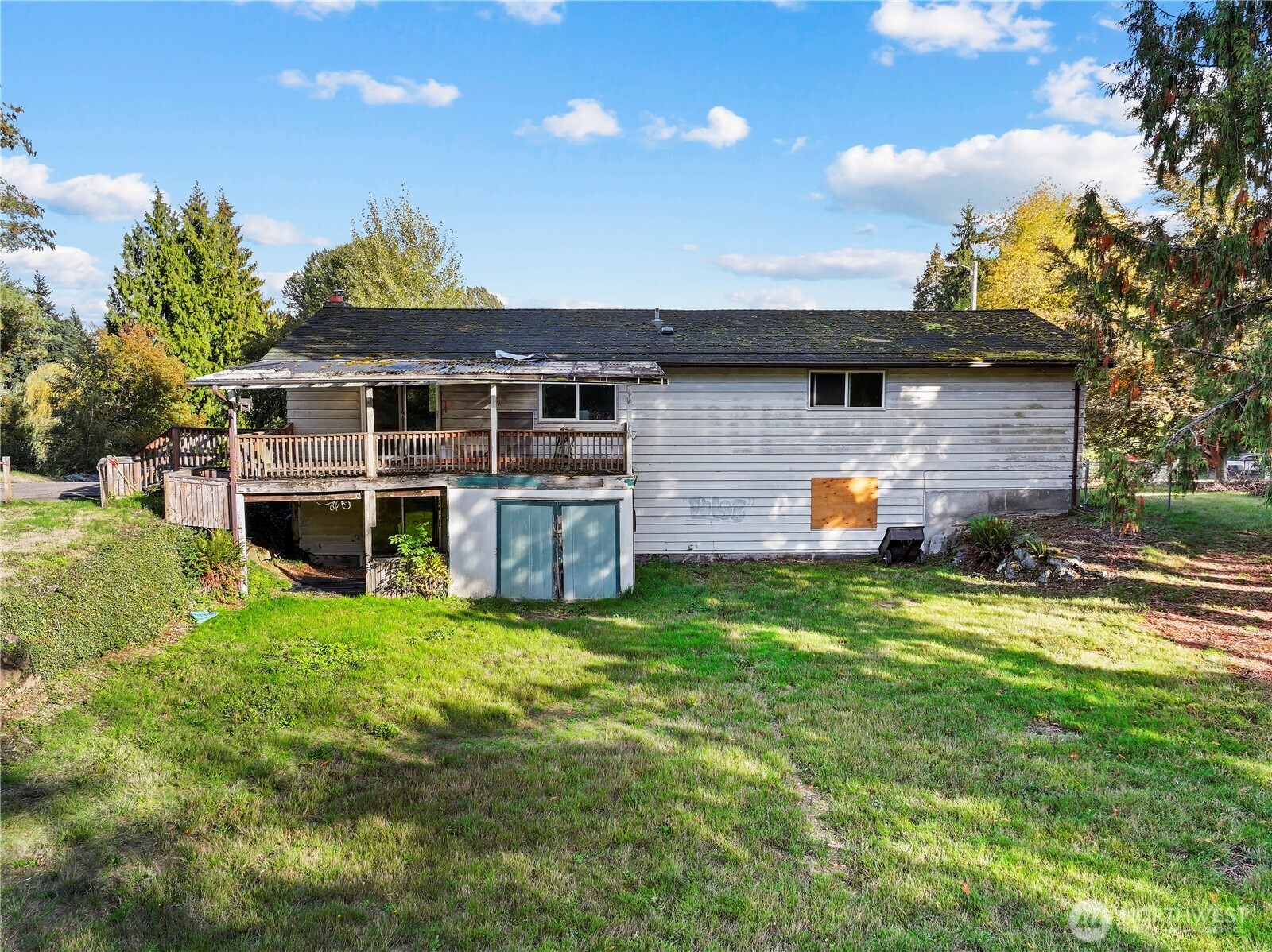 23032 7th Avenue Southeast Bothell, WA 98021 - Photo 22 of 24 a view of a house with a yard and sitting area