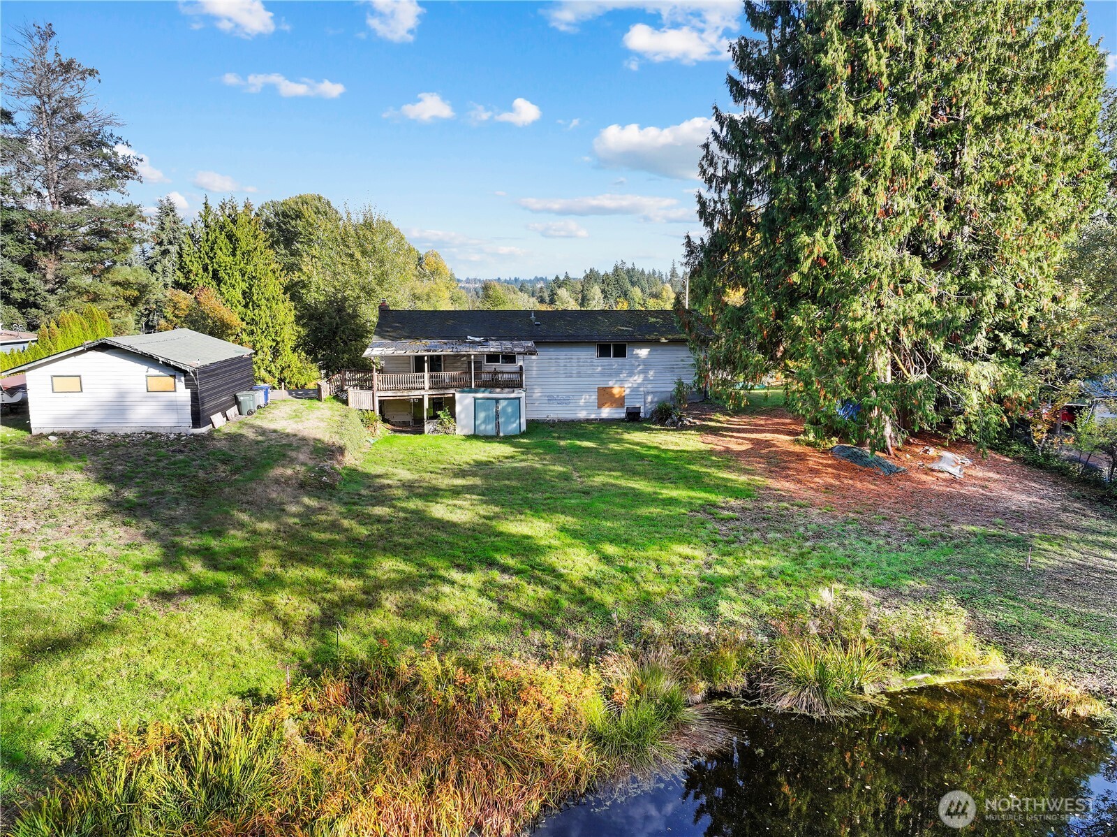 23032 7th Avenue Southeast Bothell, WA 98021 - Photo 5 of 24 a view of a house with a yard