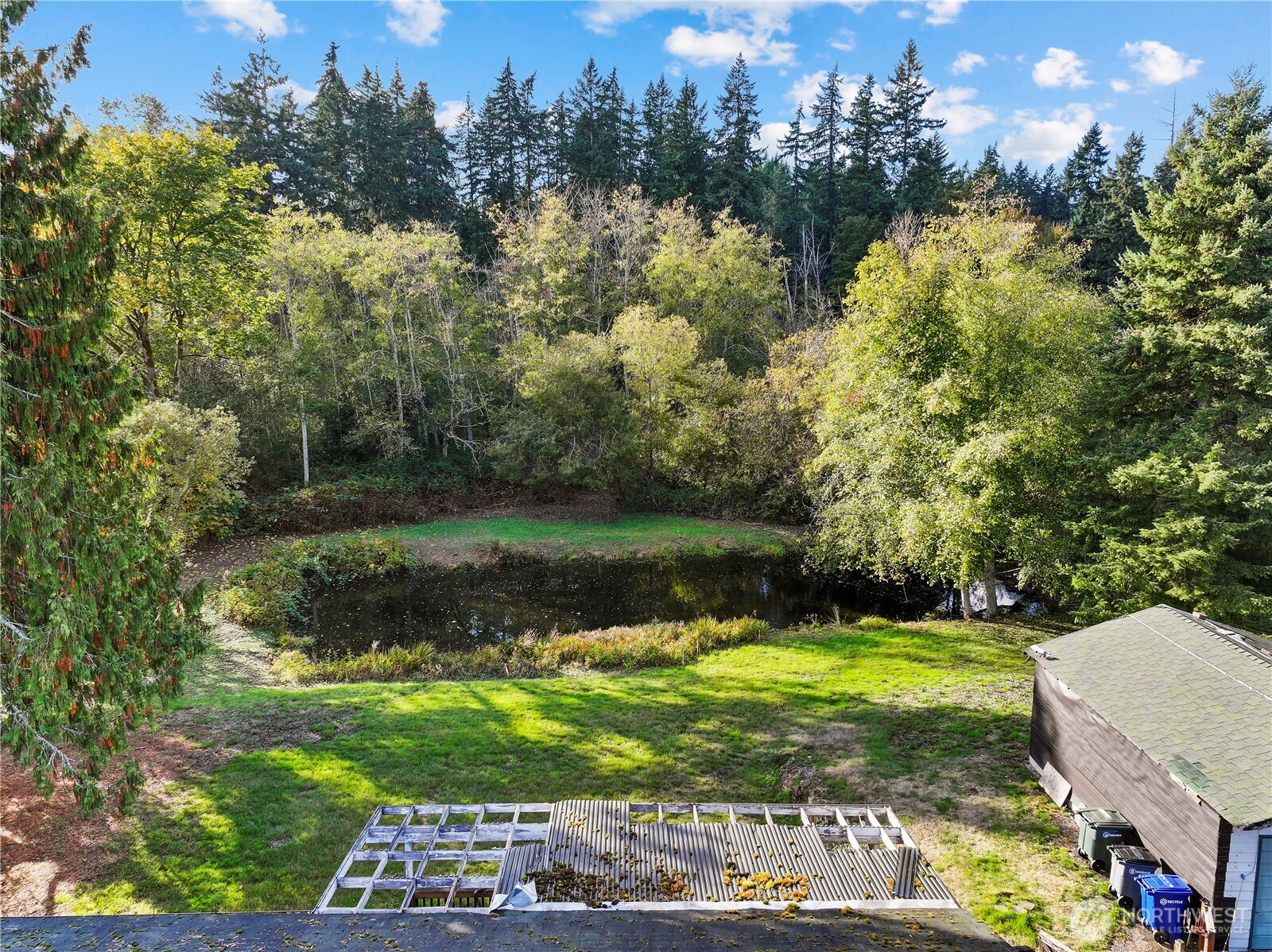 23032 7th Avenue Southeast Bothell, WA 98021 - Photo 6 of 24 a view of a golf course with a lake