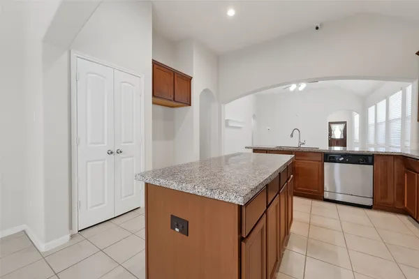 a bathroom with a sink toilet and vanity