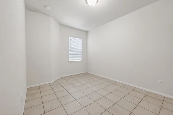 a view of a backyard with a garden and plants