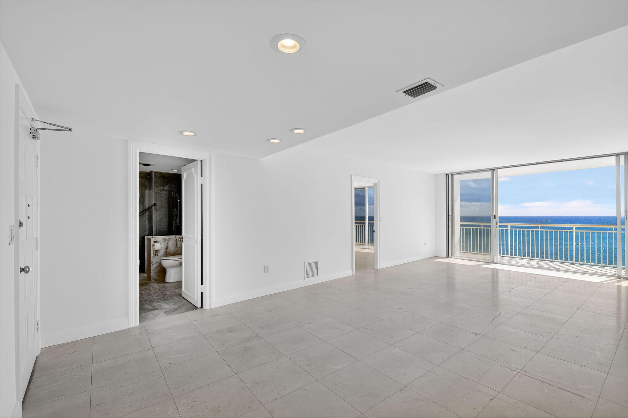 2780 South Ocean Boulevard, Unit 703 Palm Beach, FL 33480 - Photo 11 of 44 a view of an empty room with a window