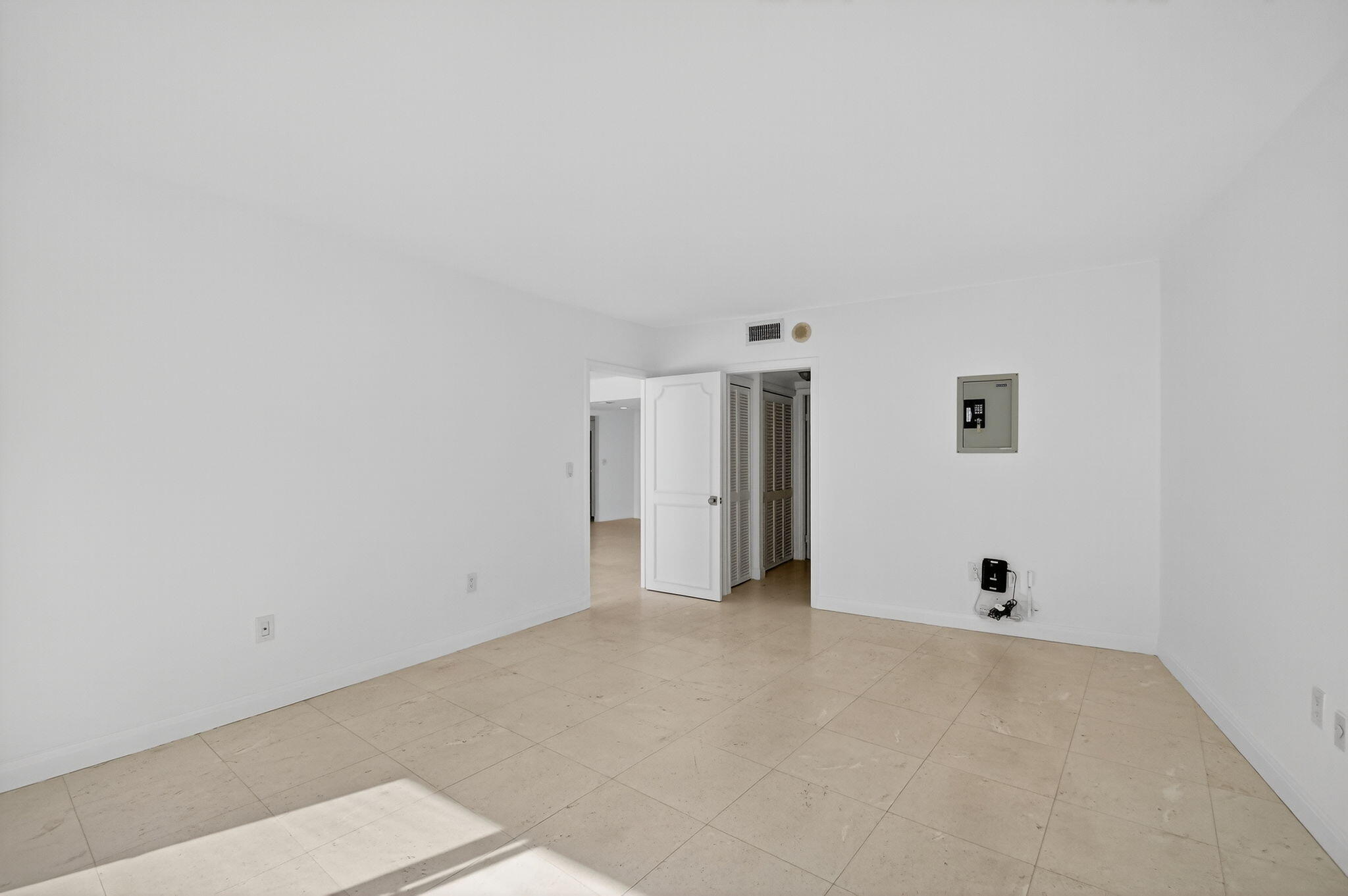 2780 South Ocean Boulevard, Unit 703 Palm Beach, FL 33480 - Photo 17 of 44 a view of an empty room with wooden floor