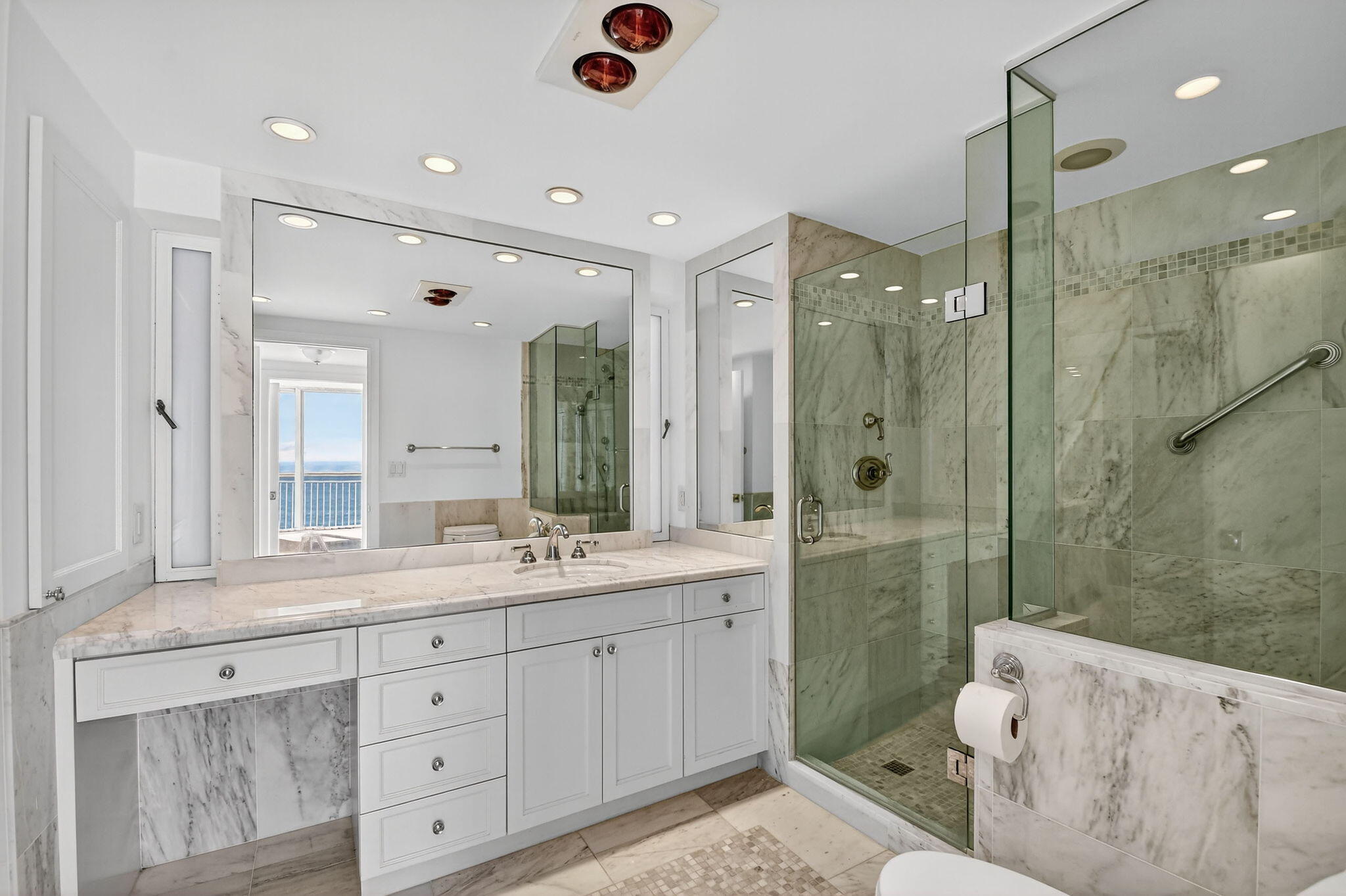 2780 South Ocean Boulevard, Unit 703 Palm Beach, FL 33480 - Photo 18 of 44 a bathroom with a double vanity sink mirror and shower