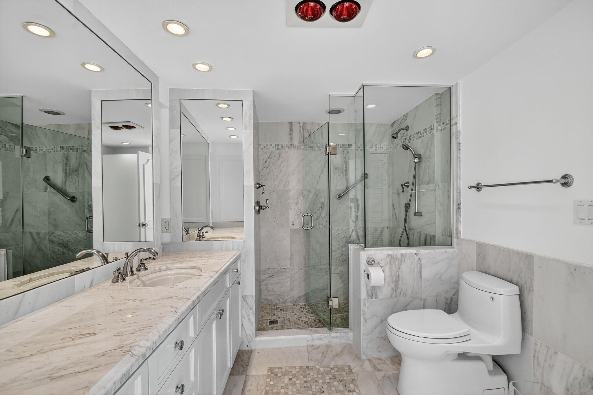 2780 South Ocean Boulevard, Unit 703 Palm Beach, FL 33480 - Photo 19 of 44 a bathroom with a granite countertop double vanity sink toilet mirror and shower